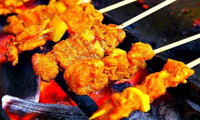 Goat Meat on Sticks being Roasted