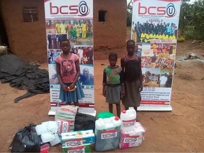 Buena Charity Services Uganda (bcsu) Distributing Material Support to the At Risk Child-Youth Individuals
